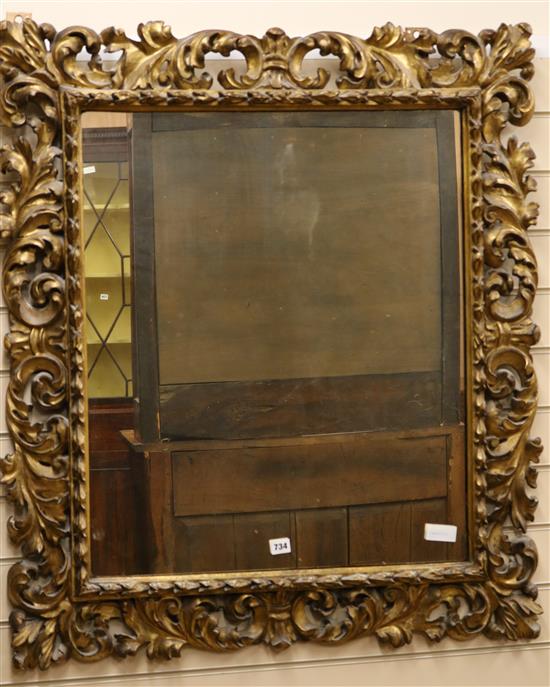 A 19th century Florentine style gilt acanthus carved wall mirror W.89cm